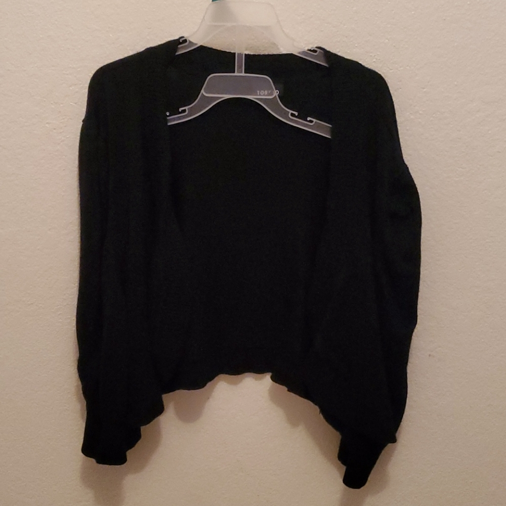 Torrid cardigan cover up sweater material.